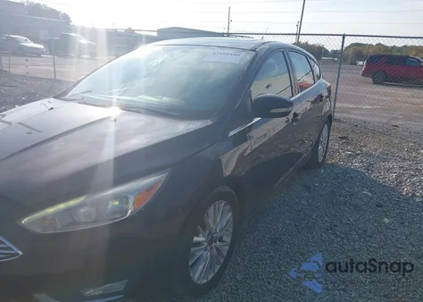 2015 Ford Focus Titanium from USA, damaged, VIN 1FADP3N24FL214270
